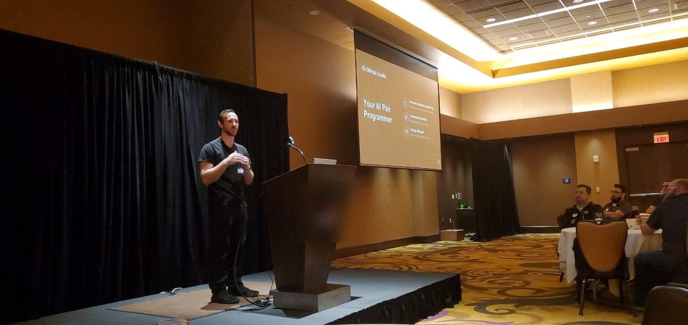 Frankie Riviera presenting a GitHub Copilot talk on stage